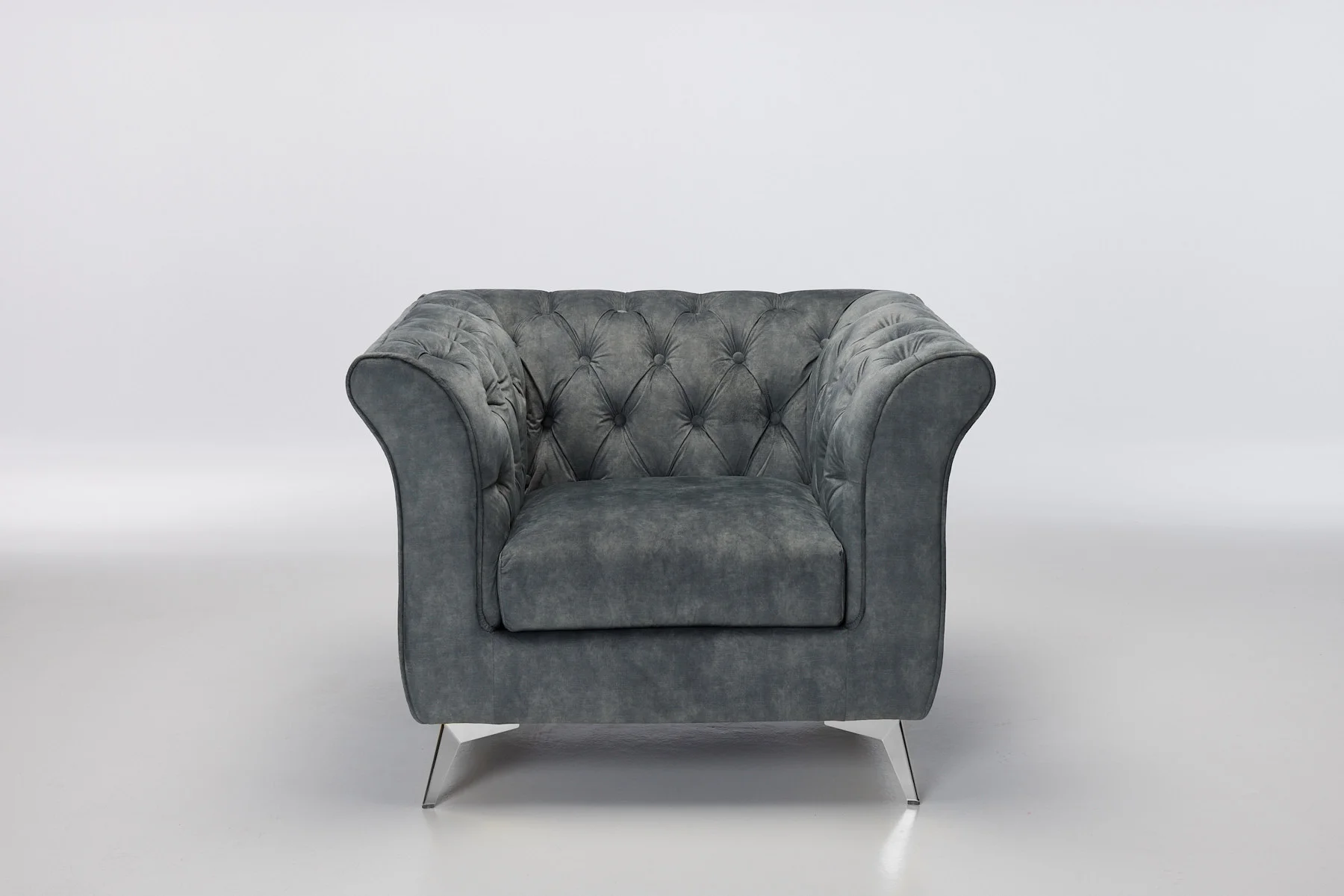 Contemporary armchair with silver accents