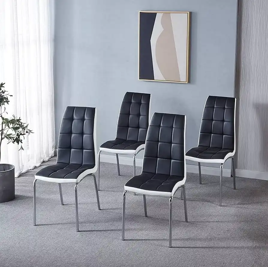 Set of four dining chairs with cushioned seats and chrome legs
